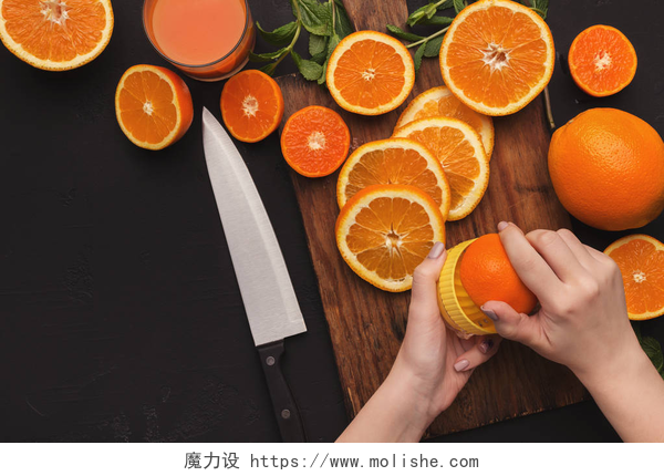 用手制作橙汁女性手做橙汁, 顶部视图